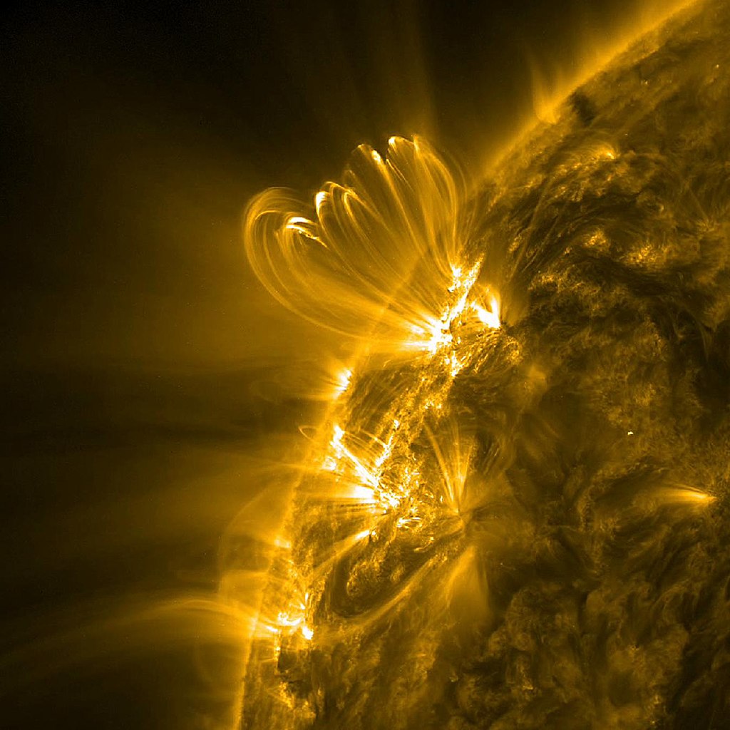 solar flare loops from sun and NASA