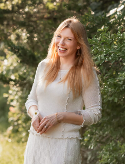 woman in white dress with long blond hair