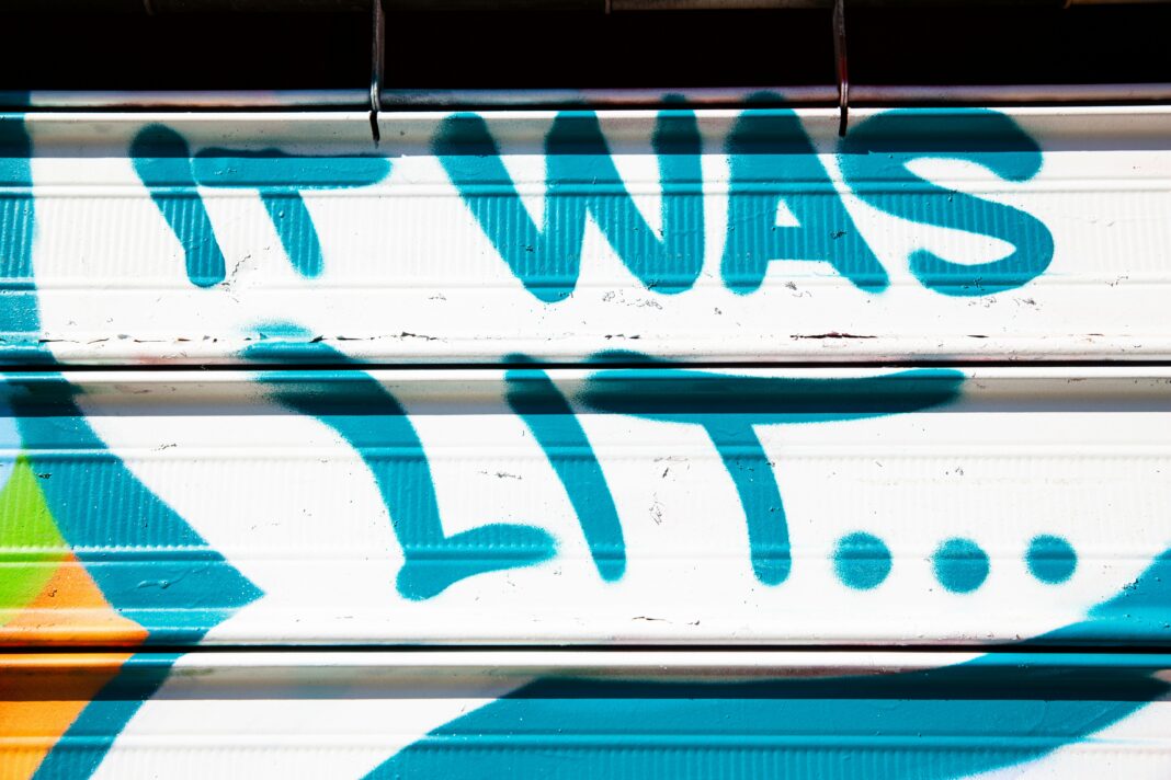 graffiti in NYC that says in blue lettering 